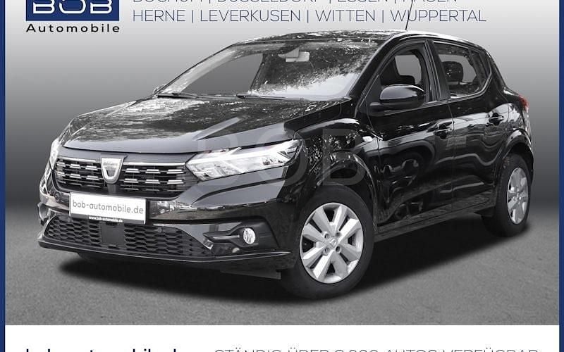 Perlmuttschwarz met (schwarz) (schwarz) Gebraucht 2022 Dacia Sandero Comfort Kleinwagen | 16.180 € (Fairer Preis) - Bild 1/4