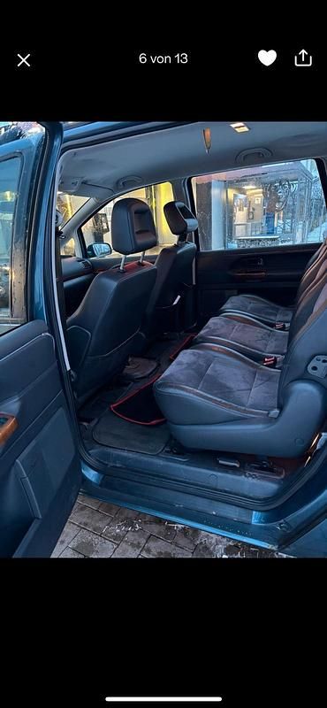 Second-hand VW Sharan 131 CP (96 kW) 2004 Albastru Monovolum