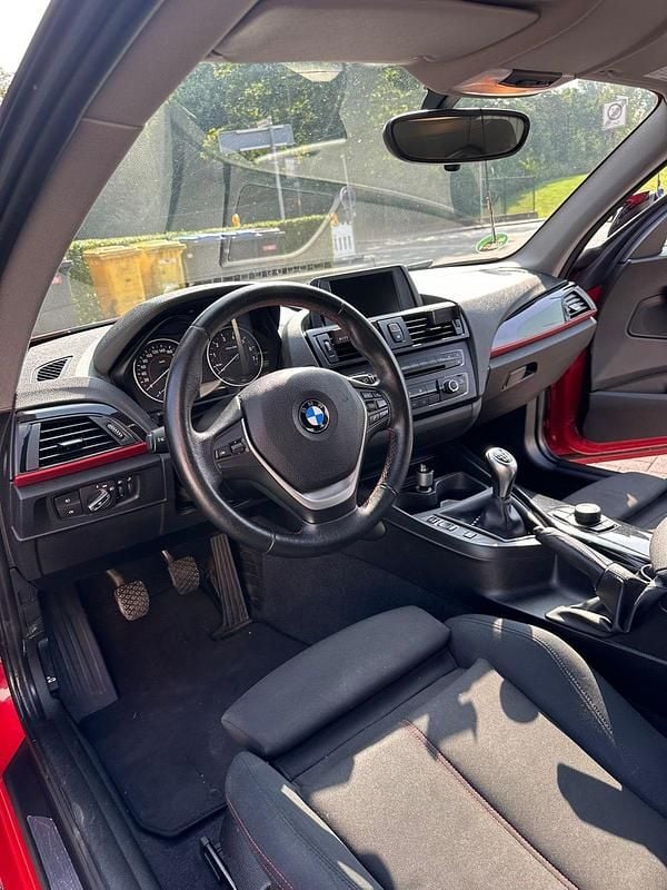Gebraucht BMW 114 102 PS (75 kW) 2012 Rot Kleinwagen