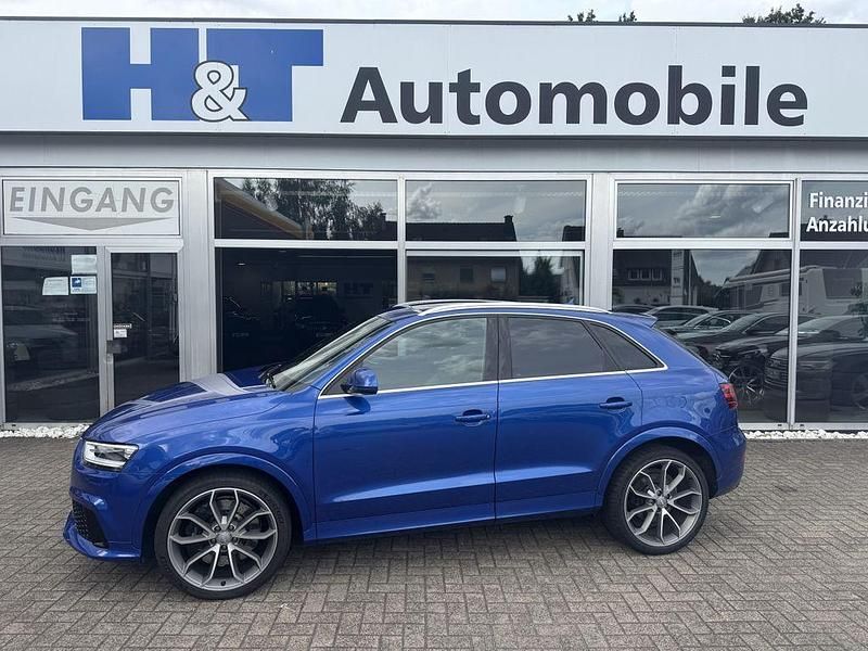 Sepangblau perleffekt Gebraucht 2014 Audi RS Q3 Sport SUV | 27.950 € (Fairer Preis) - Bild 1/4