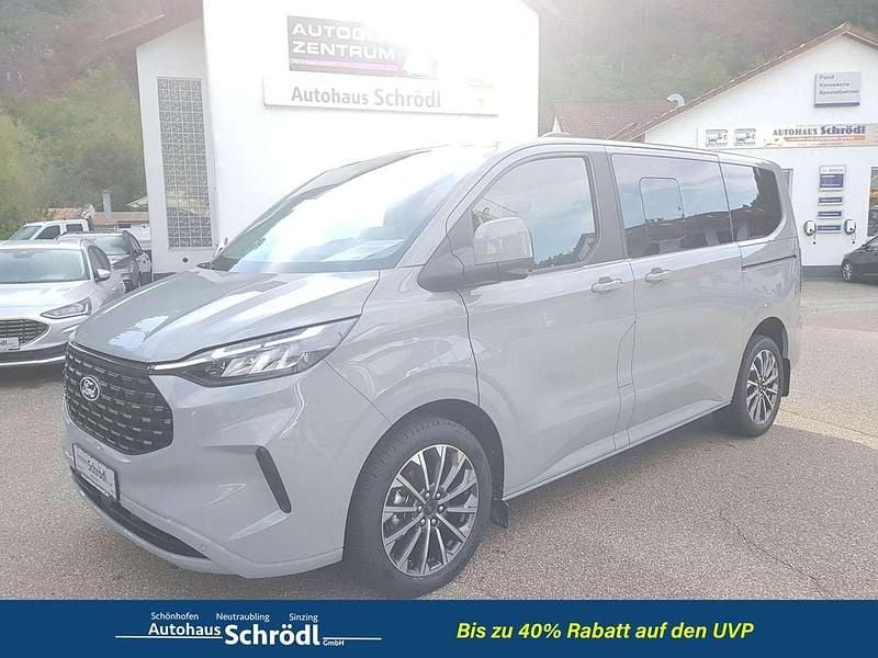 Grau Neu 2025 Ford Tourneo Custom Titanium X Van / Kleinbus | 55.990 € (Guter Preis) - Bild 1/4