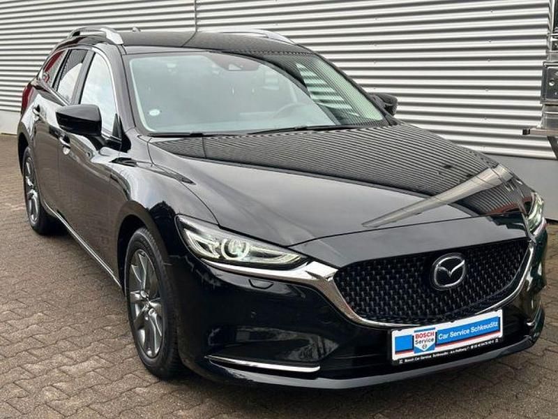 Jet black (metallic) Gebraucht 2020 Mazda 6 Exclusive-Line Kombi | 23.479 € (Fairer Preis) - Bild 1/4