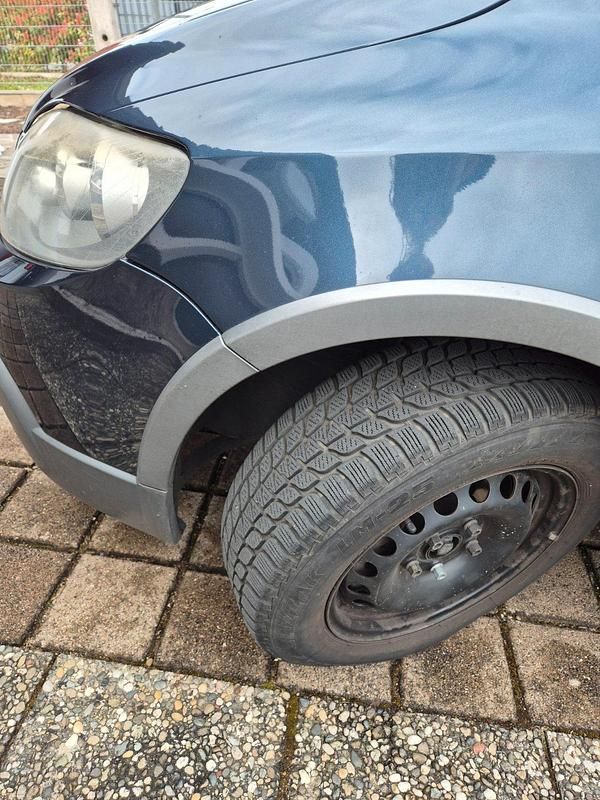 Second-hand VW Golf 105 CP (77 kW) 2007 Albastru SUV