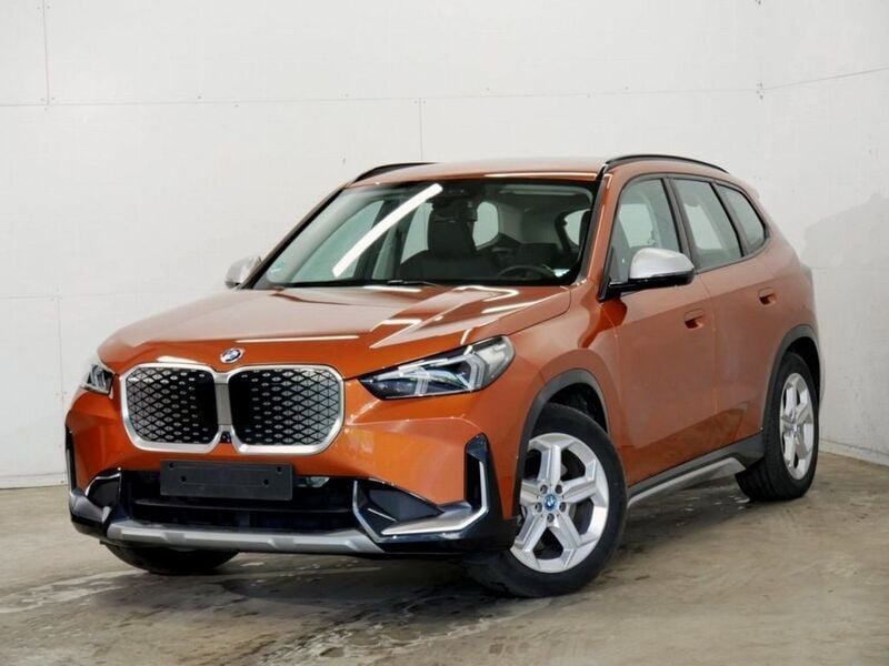 Utha orange metallic Gebraucht 2024 BMW iX1 xLine SUV | 39.890 € (Superpreis) - Bild 1/4