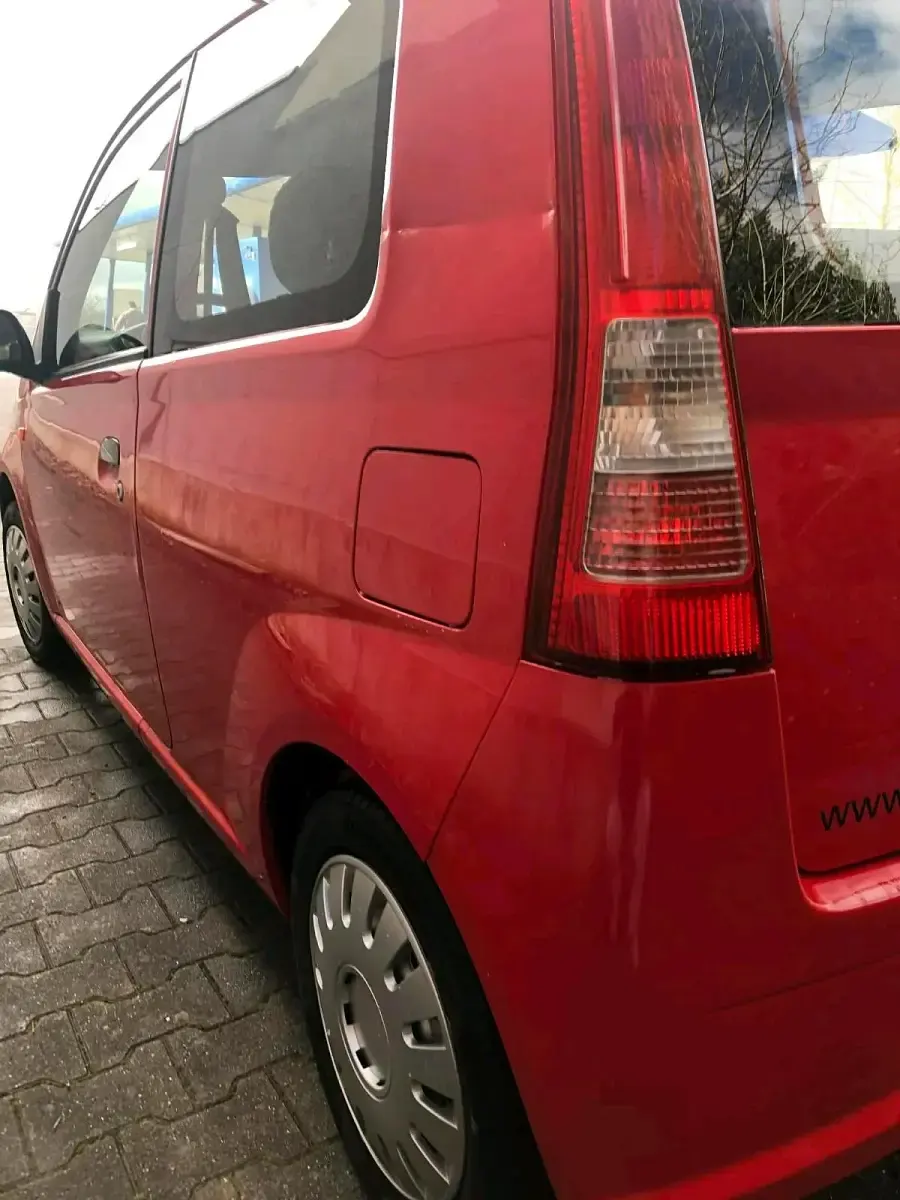 Gebraucht Daihatsu Cuore 53 PS (38 kW) 2004 Rot Kleinwagen
