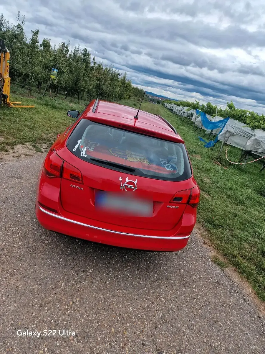 Usata Opel Astra 110 CV (80 kW) 2013 Rosso Station wagon