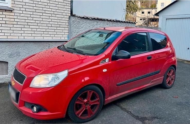 Second-hand Chevrolet Aveo 84 CP (61 kW) 2009 Roșu Hatchback