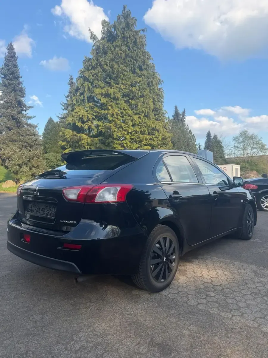 Second-hand Mitsubishi Lancer 143 CP (105 kW) 2009 Negru Berlinǎ