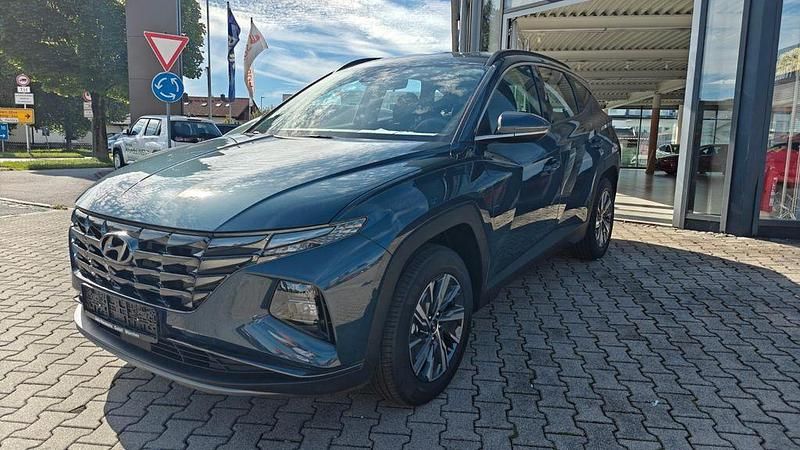 Blau Neu 2024 Hyundai Tucson Select SUV | 31.980 € (Superpreis) - Bild 1/4
