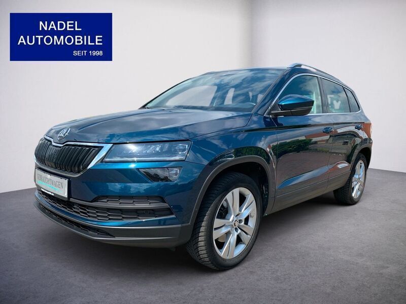 Lavablau metallic Gebraucht 2020 Skoda Karoq Style SUV | 23.490 € (Guter Preis) - Bild 1/4