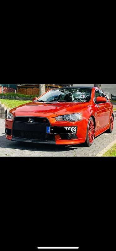 Orange Gebraucht 2011 Mitsubishi Lancer Limousine | 15.500 € - Bild 1/4