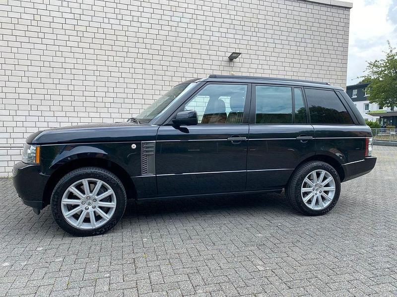 Sumatra black Gebraucht 2011 Land Rover Range Rover Vogue SUV | 19.900 € (Teuer) - Bild 1/4