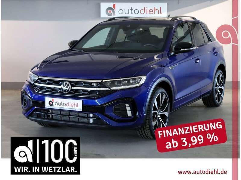 Blue metallic Gebraucht 2024 VW T-Roc R-line SUV | 33.790 € (Fairer Preis) - Bild 1/4
