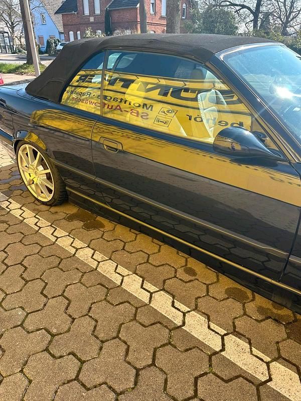 Gebraucht BMW 318 Cabriolet 118 PS (86 kW) 1995 Schwarz Cabrio