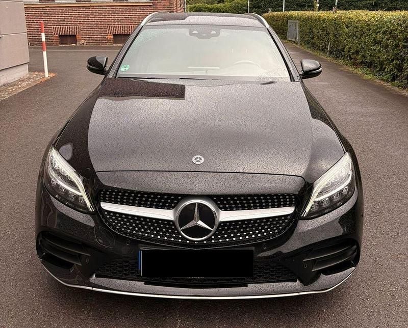 Schwarz Gebraucht 2021 Mercedes C180 AMG line Limousine | 21.400 € (Superpreis) - Bild 1/4