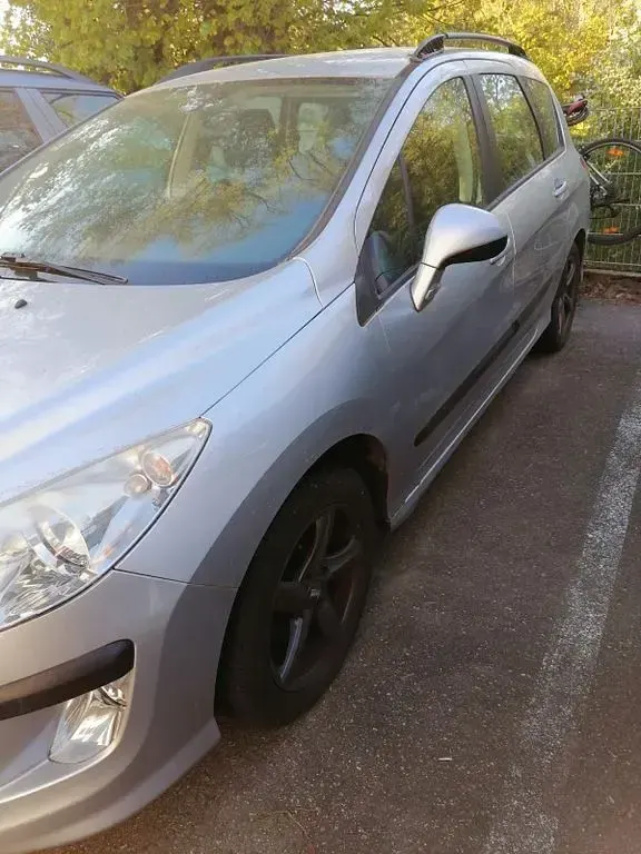 Gebraucht Peugeot 308 113 PS (83 kW) 2011 Silber Kombi