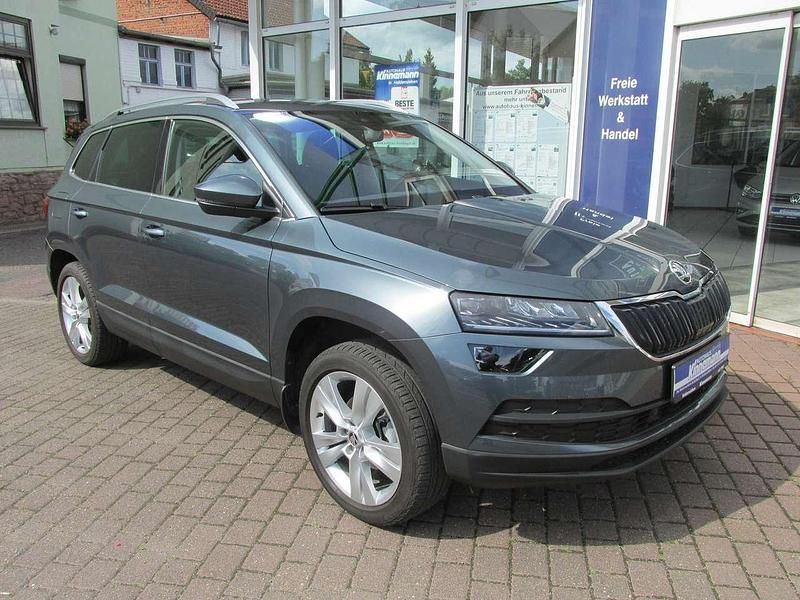 Quarzgrau metallic Gebraucht 2019 Skoda Karoq Style SUV | 22.975 € (Fairer Preis) - Bild 1/3