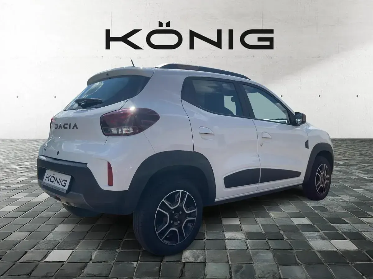 Gebraucht Dacia Spring Extreme 47 kW (65 PS) 2023 Weiß Kleinwagen