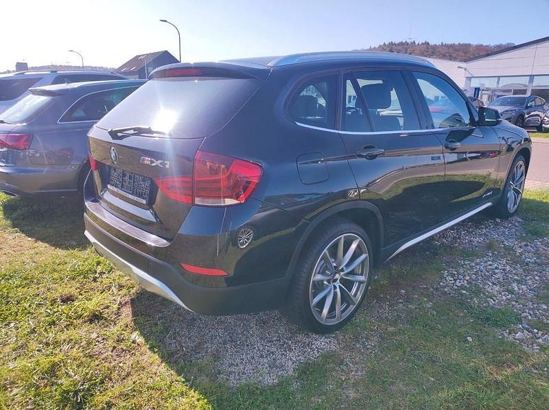 Second-hand BMW X1 Performance 218 CP (160 kW) 2012 Negru SUV