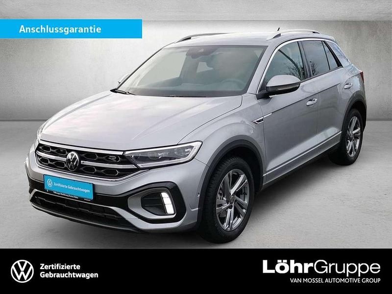 Pyritsilber metallic Gebraucht 2024 VW T-Roc R-line SUV | 27.680 € (Teuer) - Bild 1/3