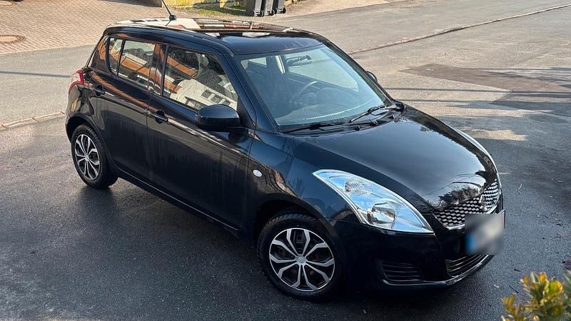 Gebraucht Suzuki Swift Club 94 PS (69 kW) 2012 Schwarz Kleinwagen