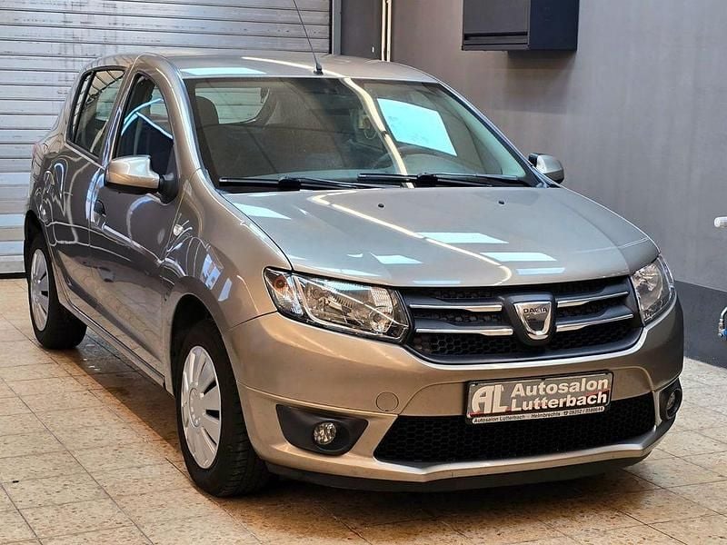 Gold Gebraucht 2014 Dacia Sandero Lauréate Kleinwagen | 2.698 € (Superpreis) - Bild 1/4