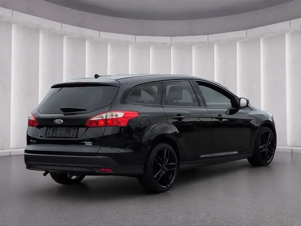 Gebraucht Ford Focus 125 PS (91 kW) 2014 Schwarz metallic Kombi
