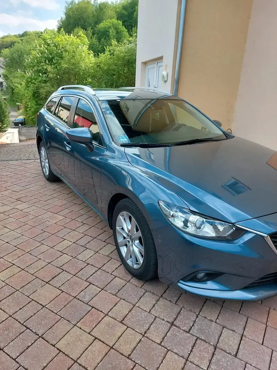 Używany Mazda 6 150 KM (110 kW) 2013 Niebieski Kombi
