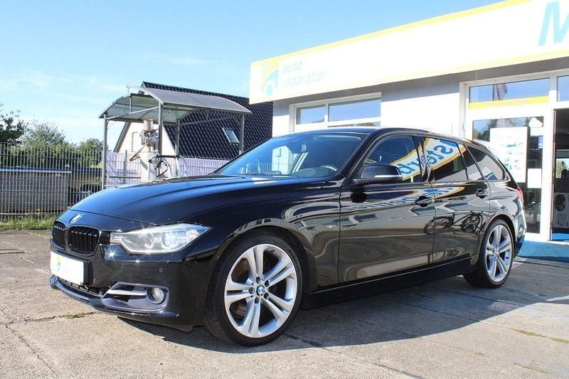 Schwarz Gebraucht 2014 BMW 330 Performance Kombi | 13.790 € (Superpreis) - Bild 1/4