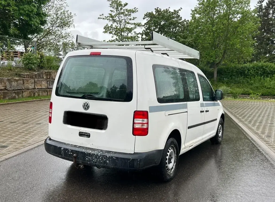 Używany VW Caddy 102 KM (75 kW) 2012 Biały Minivan