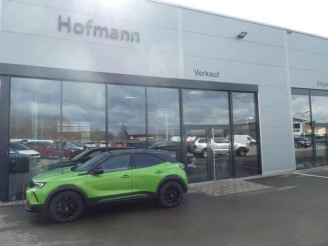 Gebraucht Opel Mokka-e 100 kW (136 PS) 2022 Grün (mamba green met) SUV