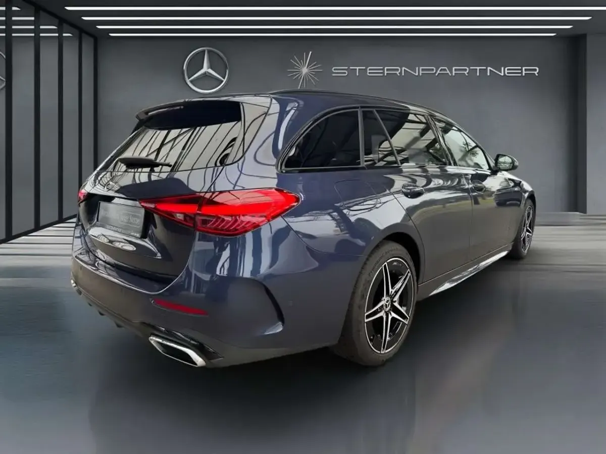 Gebraucht Mercedes C300e AMG 204 PS (150 kW) 2025 Blaulack sodalithblau Kombi