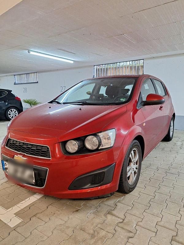 Gebraucht Chevrolet Aveo LT 101 PS (74 kW) 2012 Rot Kleinwagen