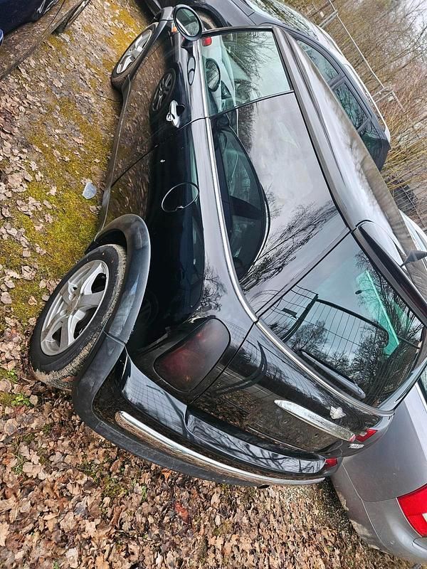 Gebraucht Mini Cooper 90 PS (66 kW) 2003 Schwarz Kleinwagen