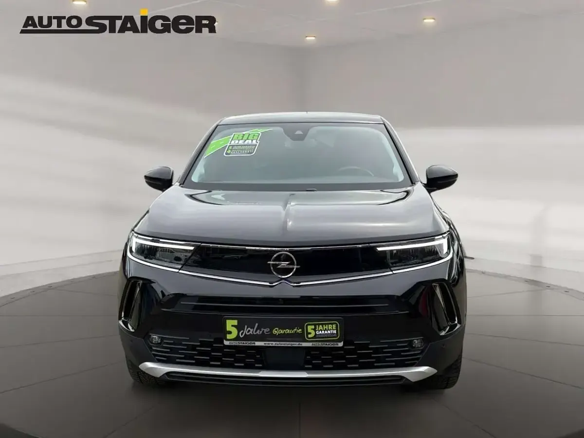 Gebraucht Opel Mokka Elegance 131 PS (96 kW) 2023 Diamant schwarz/karbon schwarz SUV