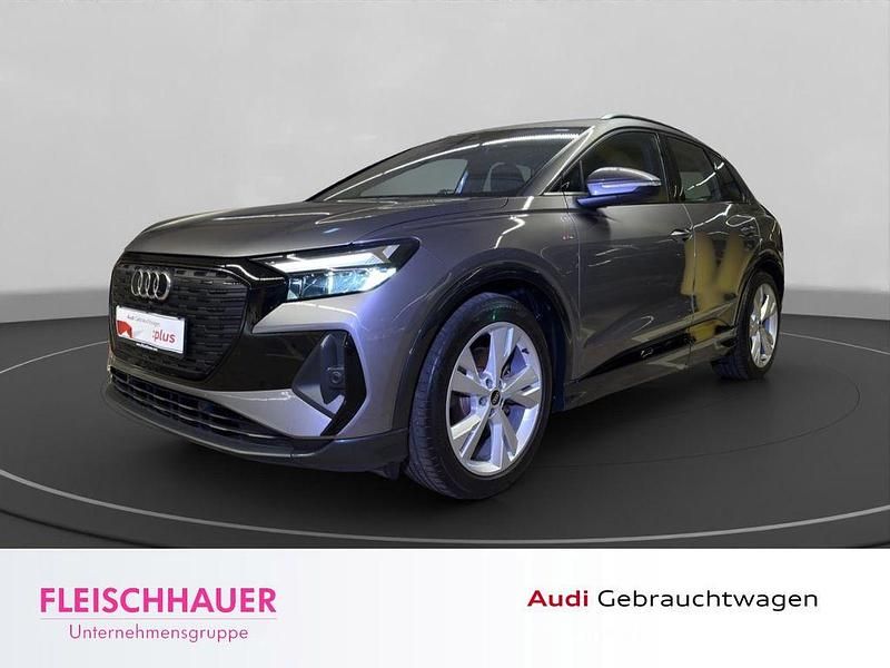 Grau Gebraucht 2021 Audi Q4 e-tron S-Line SUV | 25.990 € (Guter Preis) - Bild 1/4