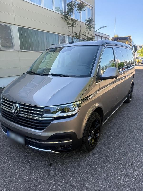 Grau Gebraucht 2023 VW T6.1 California Van | 68.800 € (Teuer) - Bild 1/4
