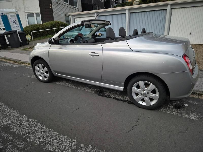 Silber Gebraucht 2006 Nissan Micra Cabrio | 2.599 € - Bild 1/4