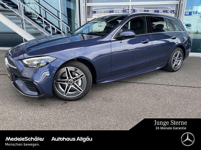 Lack sodalithblau Gebraucht 2024 Mercedes C300e AMG Kombi | 42.770 € (Superpreis) - Bild 1/4