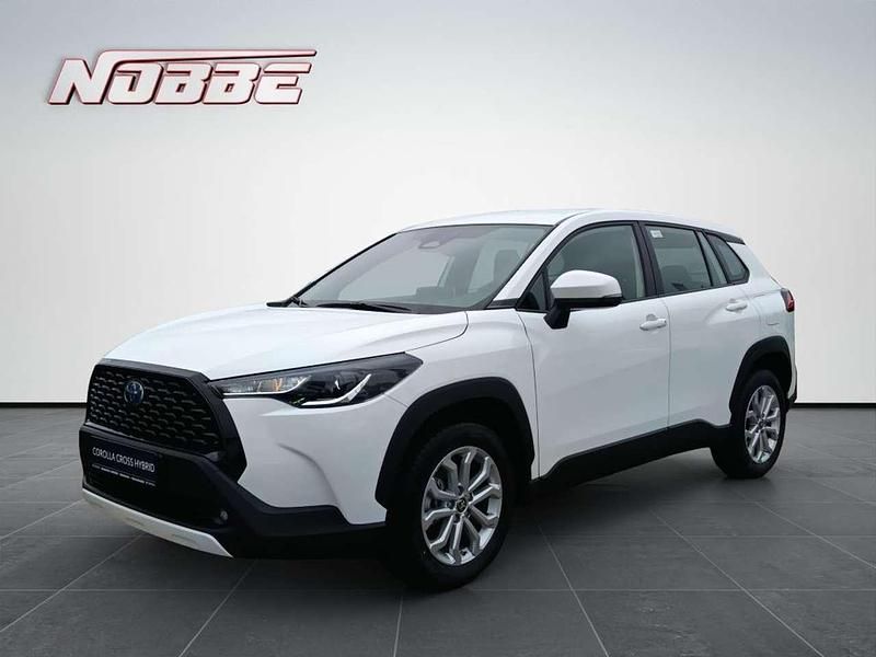 Schneeweiß Gebraucht 2024 Toyota Corolla Cross Business Edition SUV | 32.500 € (Fairer Preis) - Bild 1/4