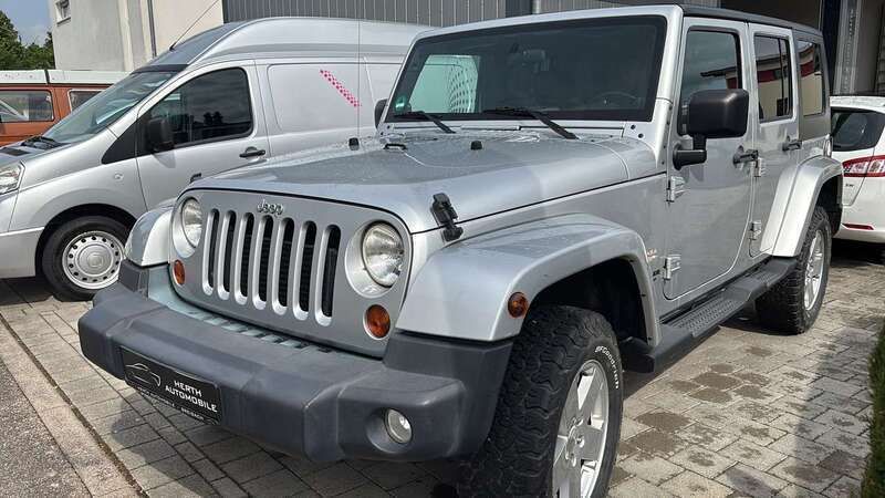 Silber Gebraucht 2010 Jeep Wrangler Unlimited Sahara SUV | 16.999 € (Superpreis) - Bild 1/4