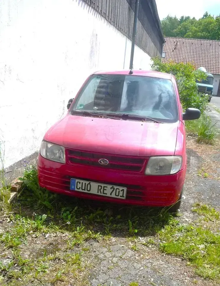 Gebraucht Daihatsu Cuore 56 PS (41 kW) 2001 Rot Kleinwagen
