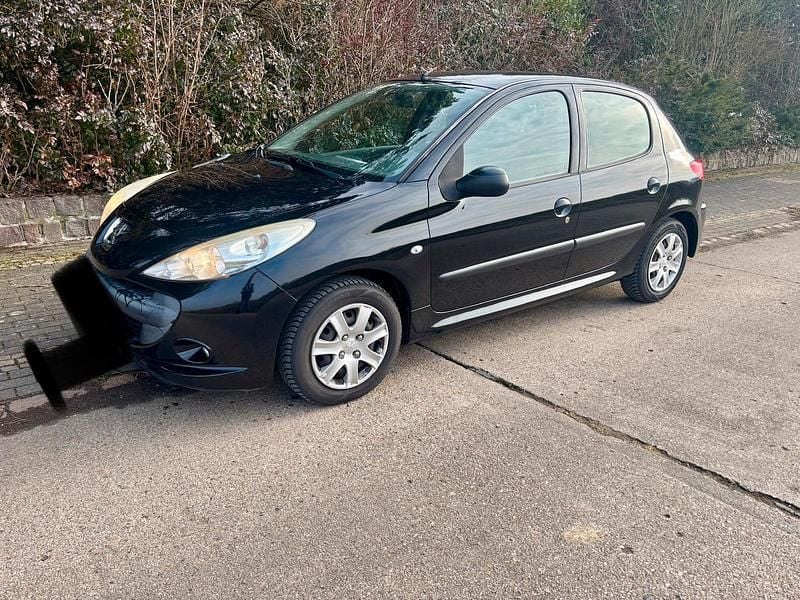 Gebraucht Peugeot 206+ 75 PS (55 kW) 2010 Schwarz Kleinwagen