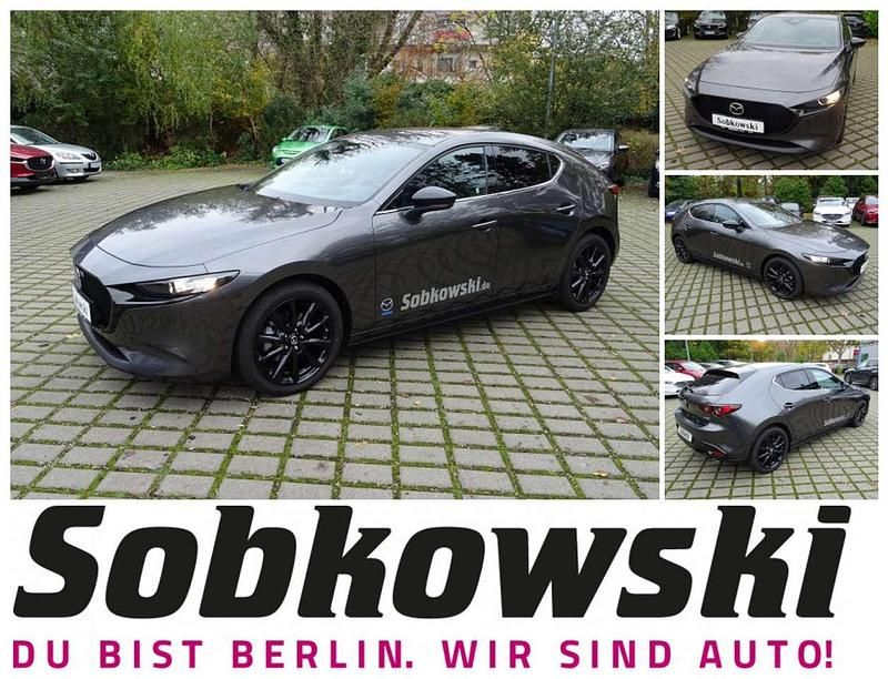 Machine gray Gebraucht 2024 Mazda 3 Limousine | 27.490 € - Bild 1/4