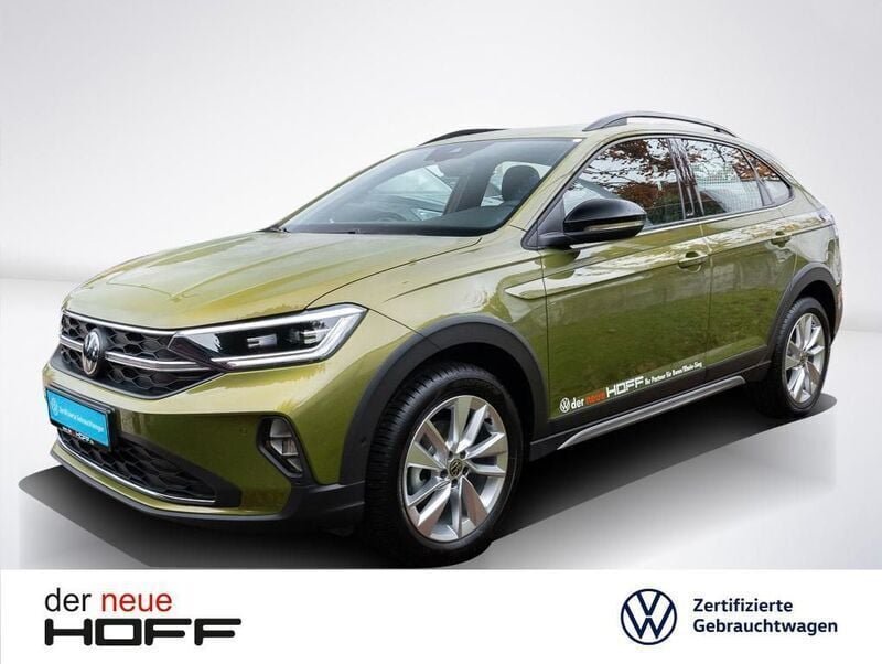 Visual green metallic Gebraucht 2024 VW Taigo Move SUV | 22.980 € (Fairer Preis) - Bild 1/4