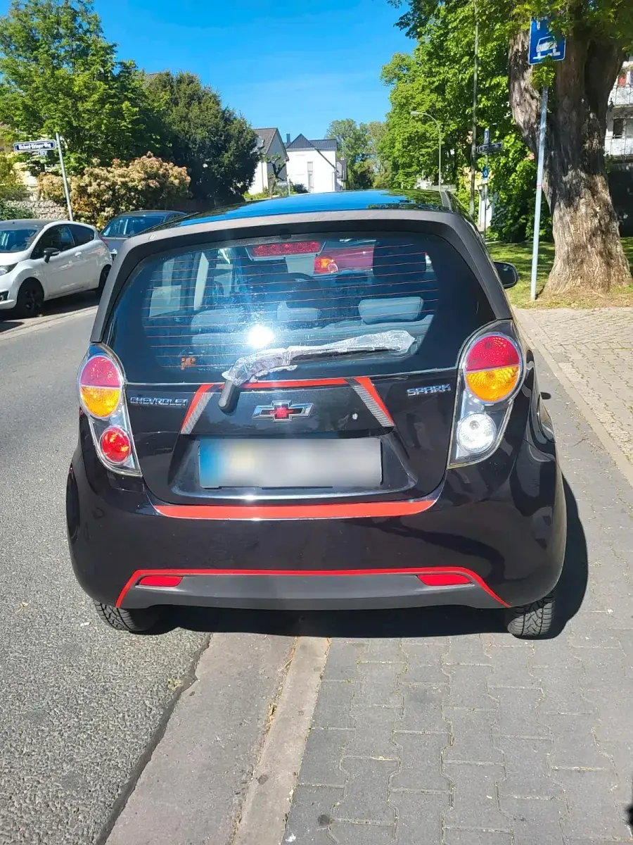 Second-hand Chevrolet Spark 68 CP (50 kW) 2012 Negru Hatchback