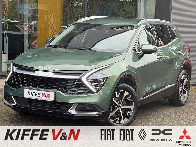 (exg) experience green met. (metallic) Gebraucht 2024 Kia Sportage Spirit SUV | 33.690 € (Superpreis) - Bild 1/4
