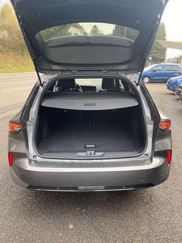 Gebraucht Opel Astra 131 PS (96 kW) 2024 Vulkangrau Kombi