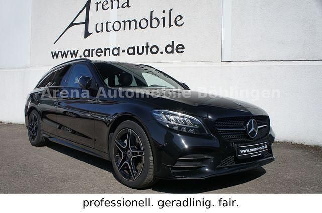 Ung. schwarz unilack Gebraucht 2020 Mercedes C200 AMG line Kombi | 26.990 € (Fairer Preis) - Bild 1/4