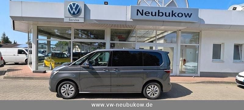 Grau Gebraucht 2023 VW Multivan Van | 48.280 € (Teuer) - Bild 1/4